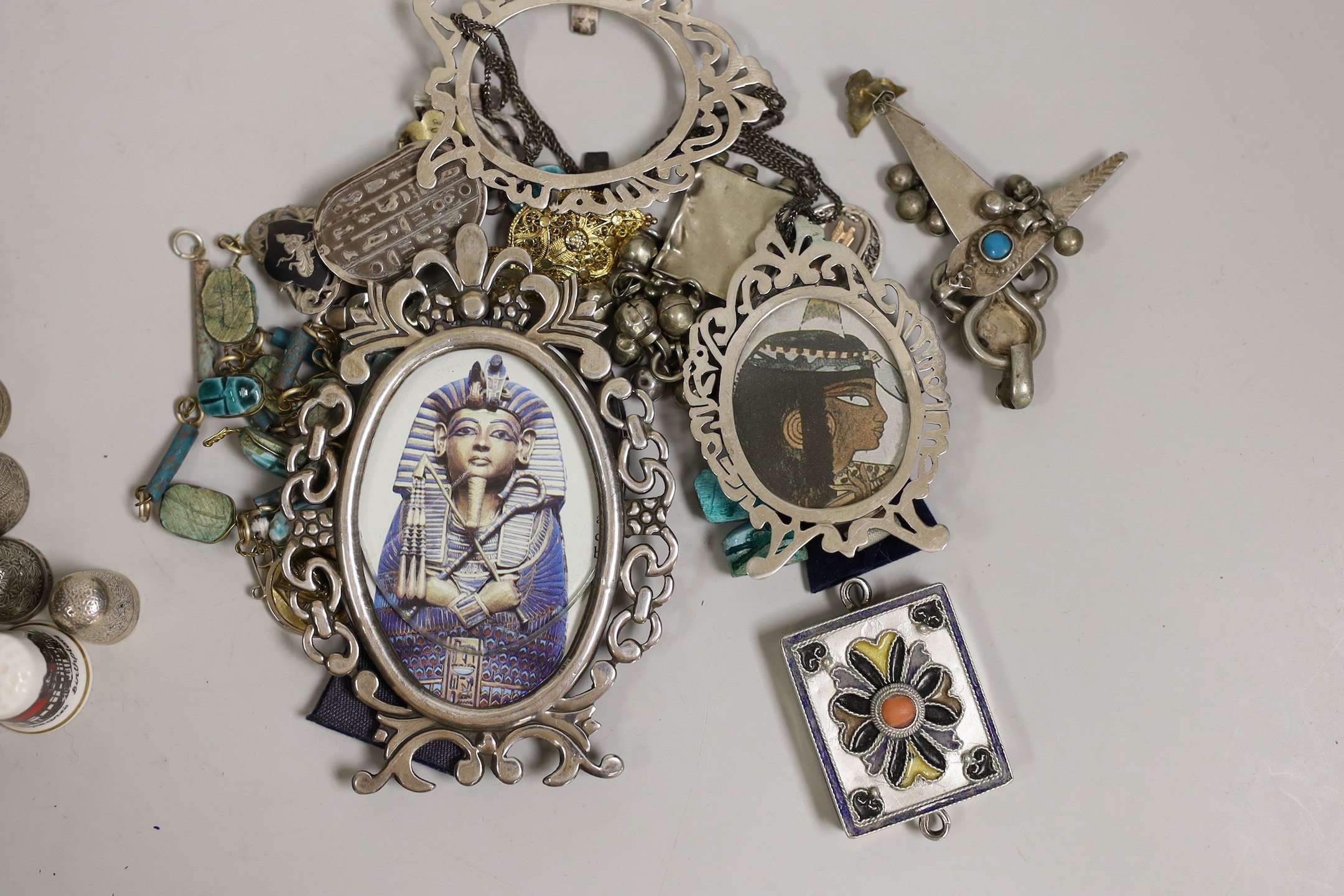 A quantity of scarab beetle style jewellery, silver frames, various thimbles etc.